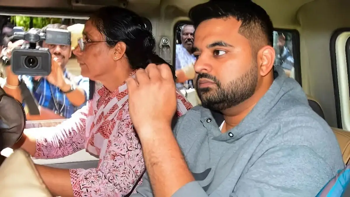 Police escort Prajwal Revanna after court verdict in Bengaluru rape case.
